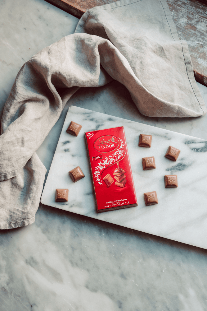 Chocolate-Lindt-Lindor-Singles-Ao-Leite-100g-Com-18-unidades